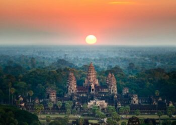 sunrise over angkor wat temple in cambodia